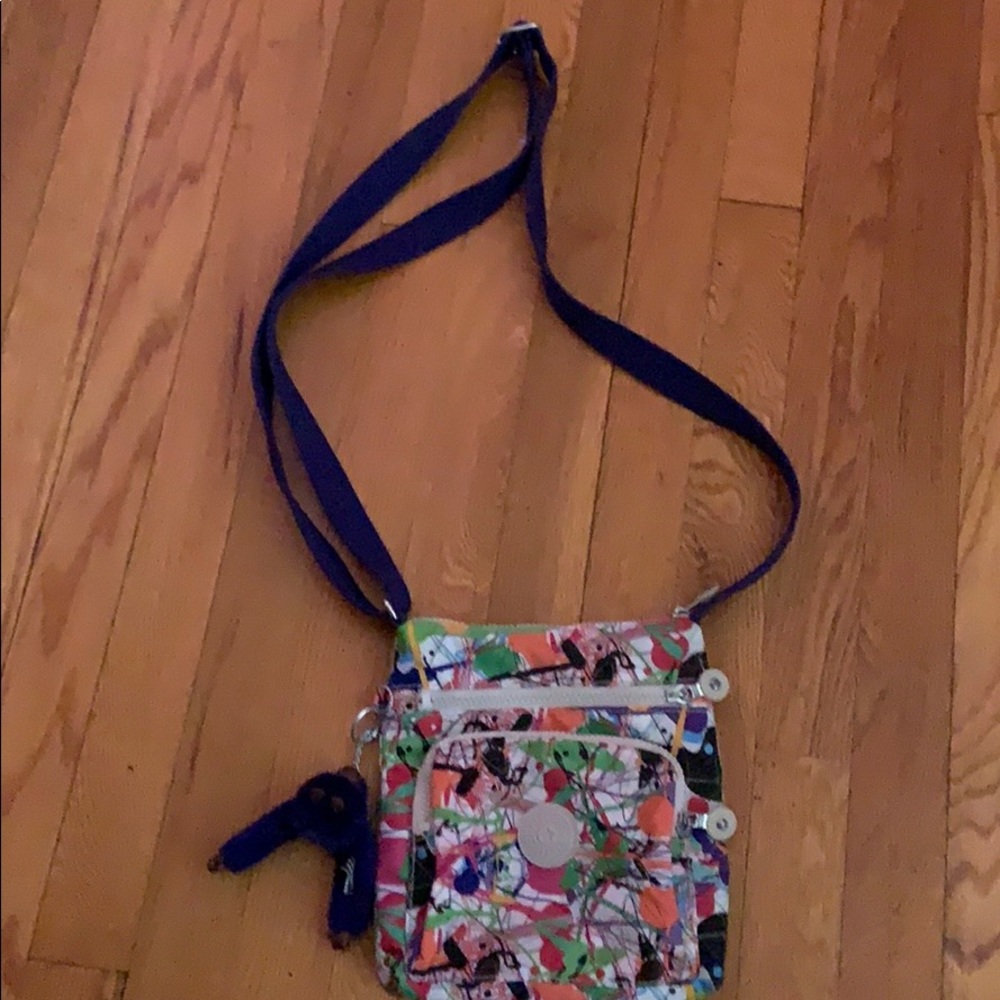 Kipling purse with 3 main pockets! Used few times!